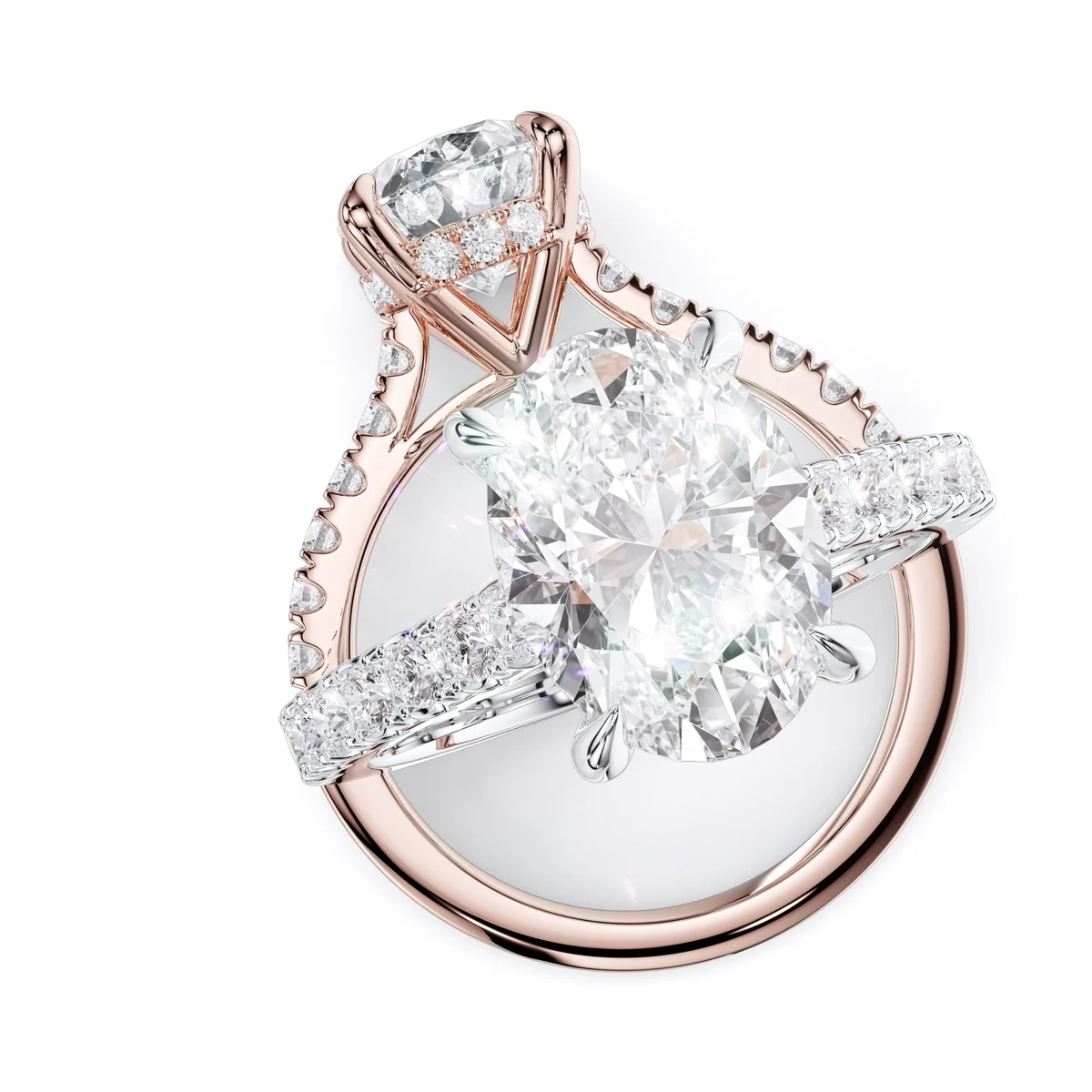 Two-tone pair: oval solitaire in white gold over rose gold band