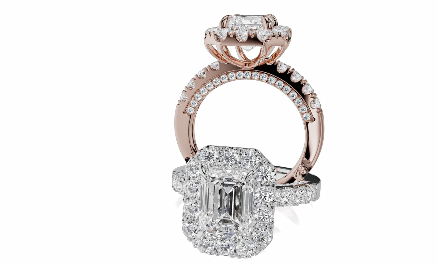 Emerald-cut halo engagement ring in white gold with rose gold hidden-halo ring behind