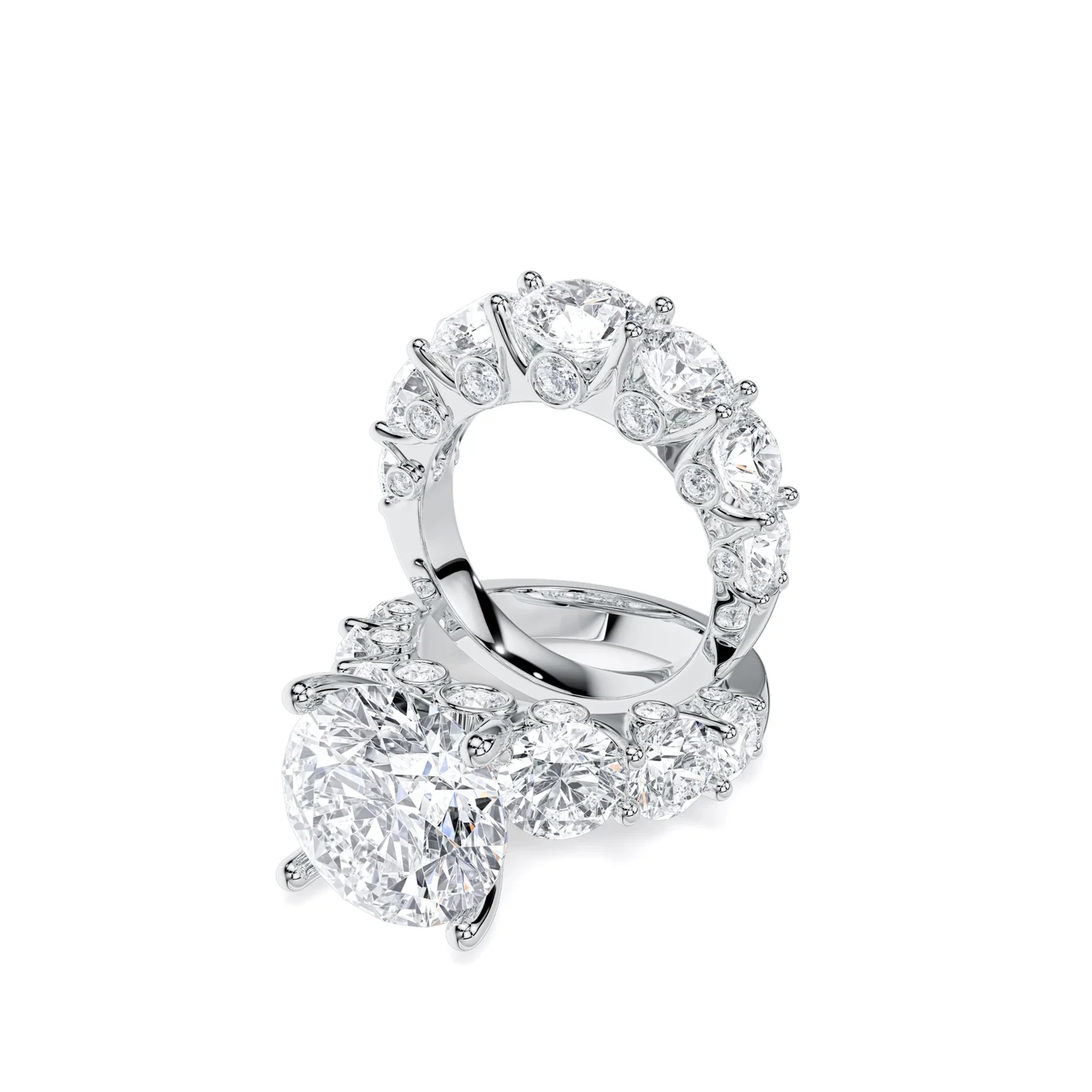 Round brilliant solitaire with matching bezel-accent band, white gold